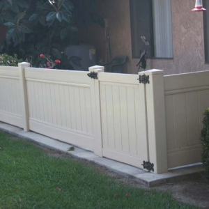 Tan Solid Vinyl Privacy Fencing with Gate