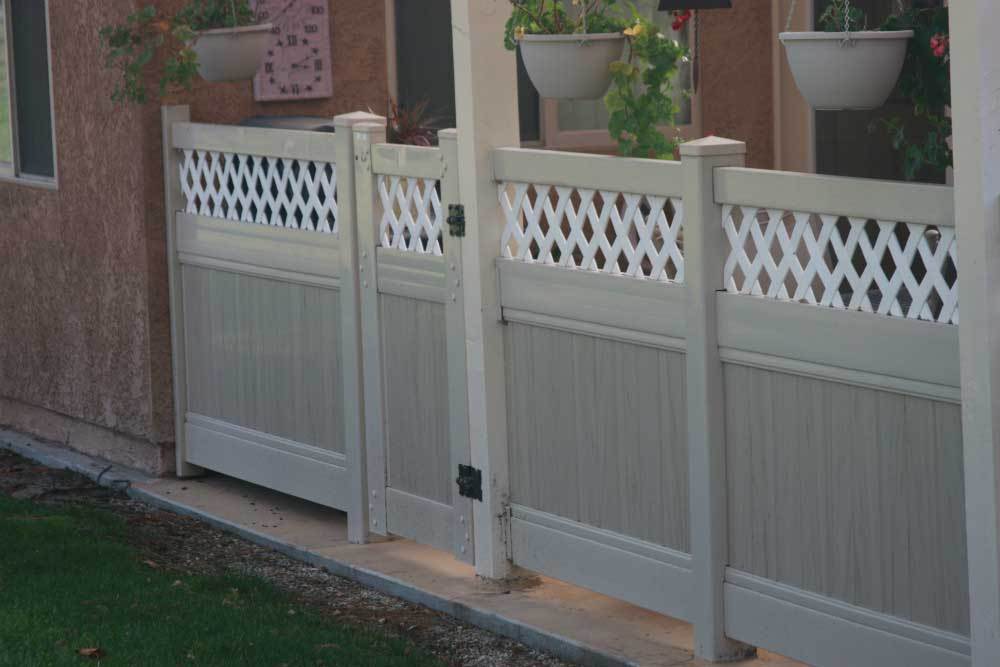 Tan Solid Vinyl Privacy Fencing with Mutli-Grain Panels and White Lattice and Gate