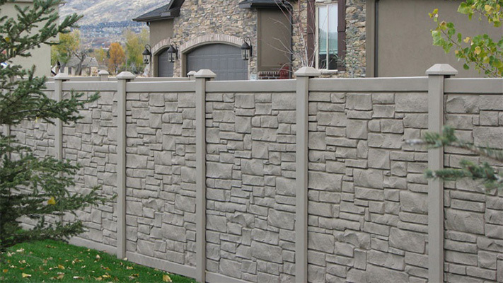 Ecostone SimTek Composite Fencing surrounding a house, an example of our Malibu homeowners association fences.