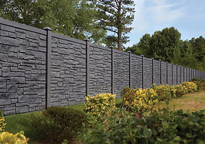 A row of dark gray SimTek fence panels, some of our luxury vinyl fencing near Bakersfield, California.