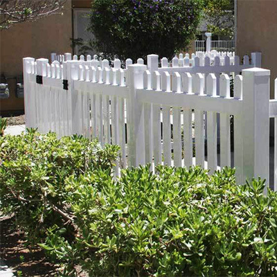White picket vinyl gate provided by Empire vinyl gate fabricators.