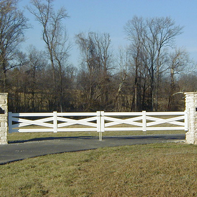 Crossbuck double drive gate supplied by Ripon vinyl gate distribution.