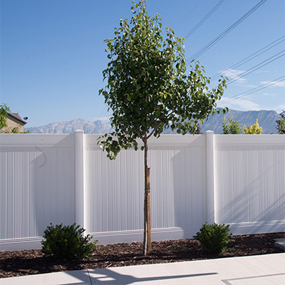 White solid privacy fence from our Planada vinyl fencing wholesaler.