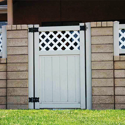 Planada vinyl fence gates fabricated by Vinyl Craft.