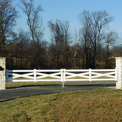 White custom ranch rail gate, one of our numerous options for wholesale vinyl gates near Pixley.