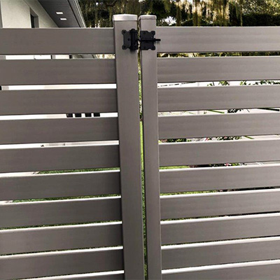 Brown semi-privacy gate, one of the numerous selections for wholesale vinyl gates near Planada, California.